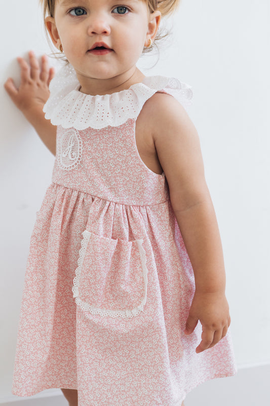 Vestido bolsillo ojitos rosados