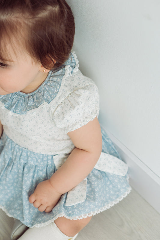 Conjunto Matchymatchy falda c/lazos flores mini fondo azul