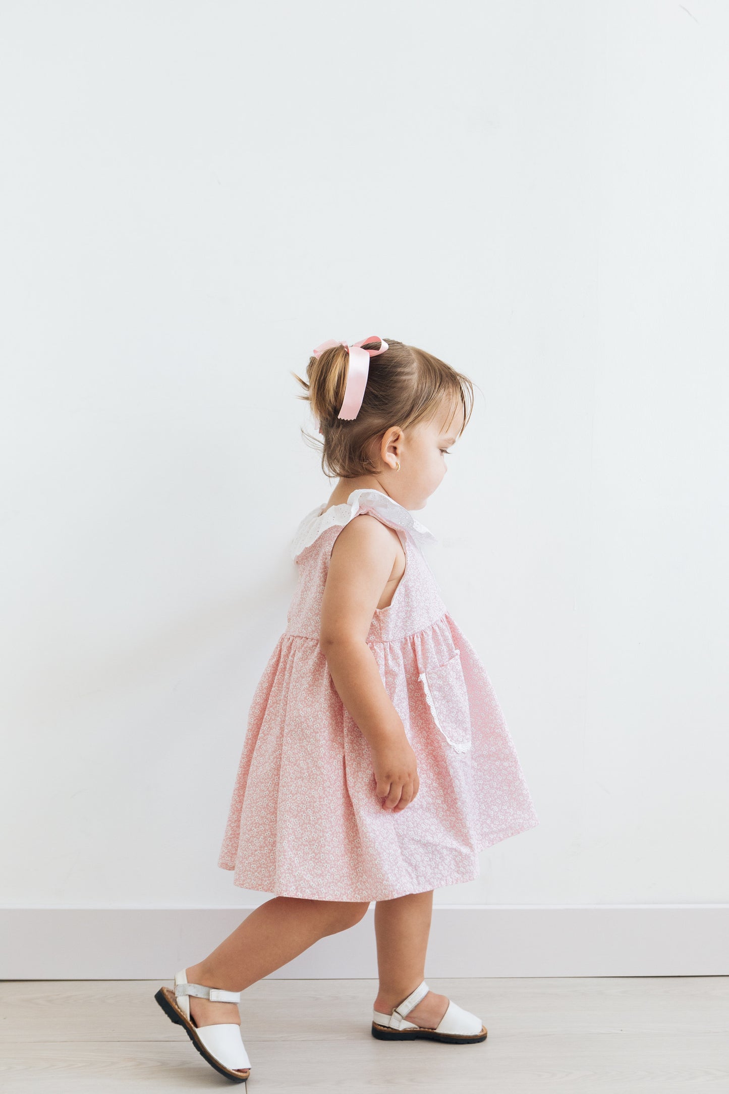 Vestido bolsillo ojitos rosados