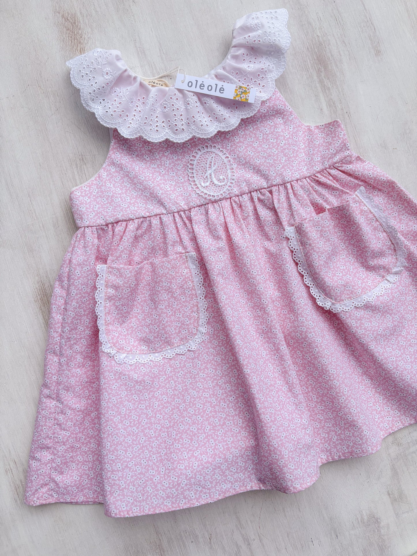 Vestido bolsillo ojitos rosados