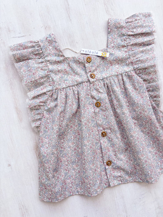 Camisa volante flores tupida rosada combinada