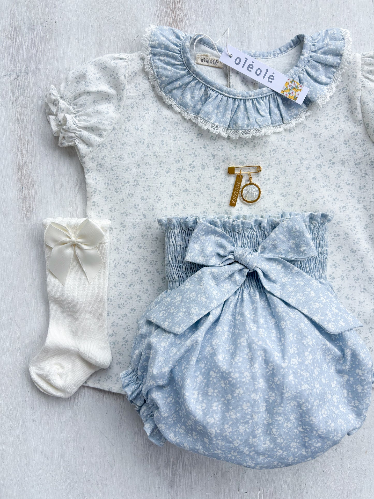 Conjunto Matchymatchy bombacha flores mini fondo azul