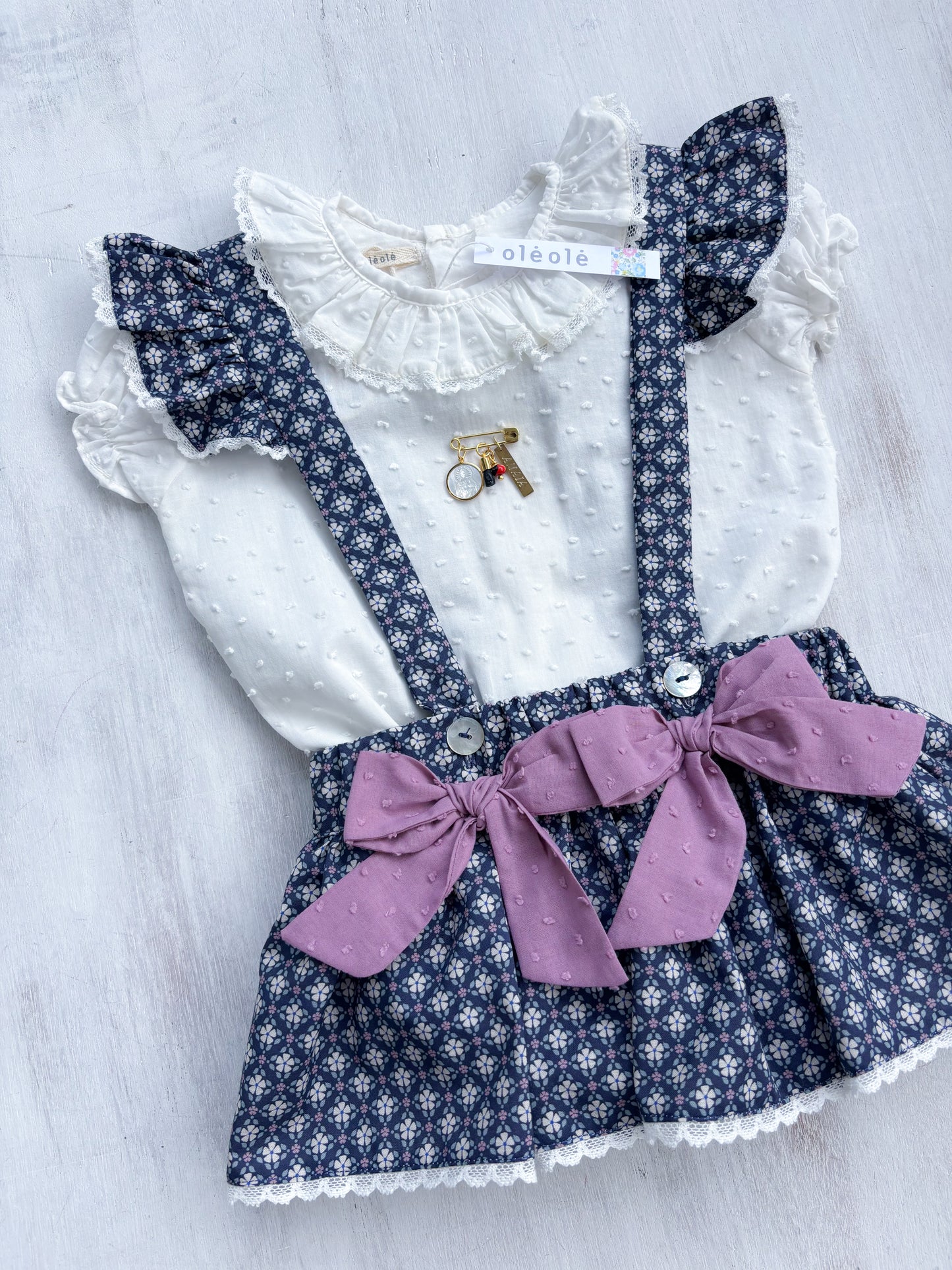 Falda c/tirantes y faralados geometrica azul marino