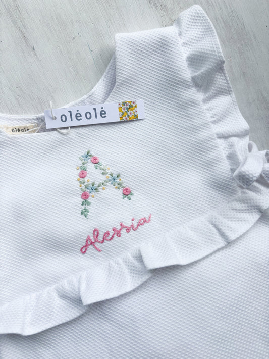 Pelele piqué bordado a mano
