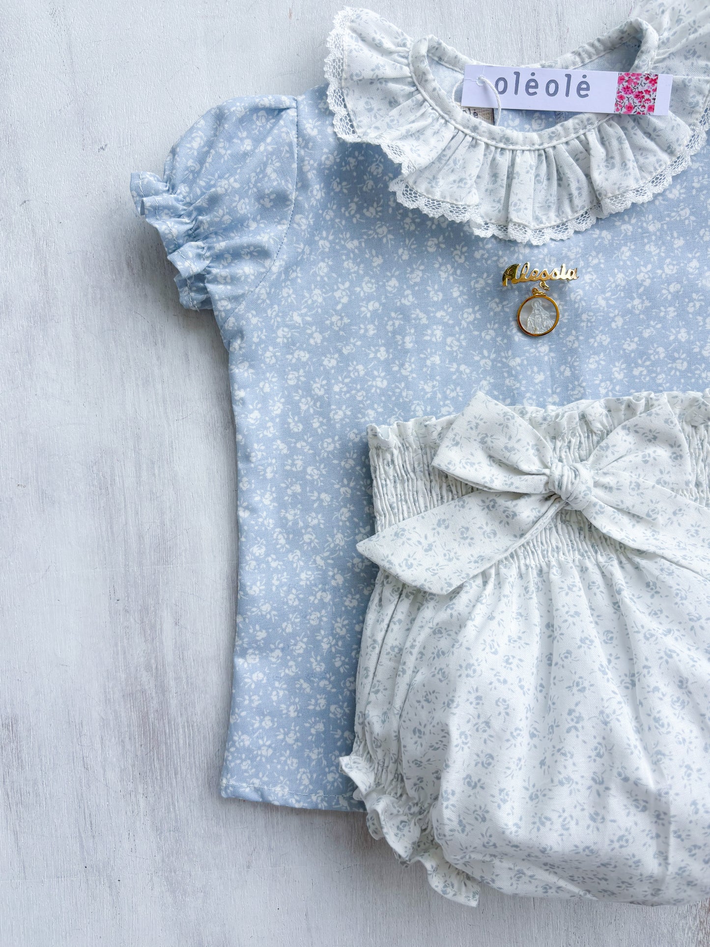 Conjunto Matchymatchy bombacha flores mini fondo azul