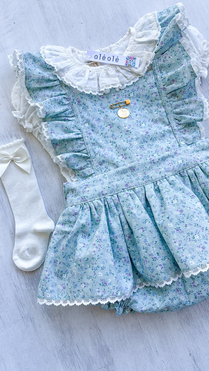 Jumper flores mini morado fondo verde agua