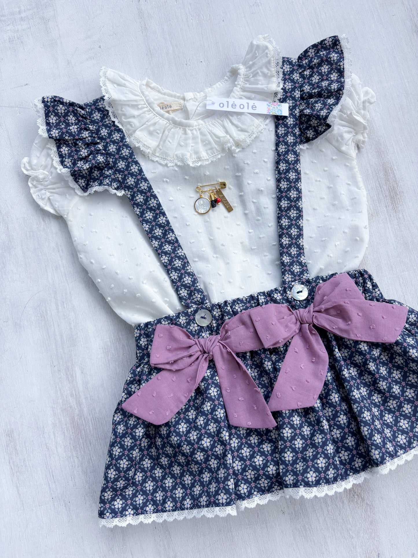 Falda c/tirantes y faralados geometrica azul marino