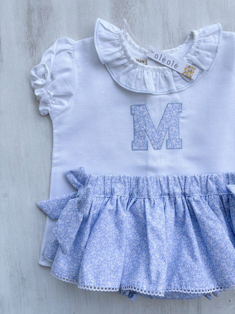 Conjunto falda c/lazos personalizado pompón mini fondo azul celeste